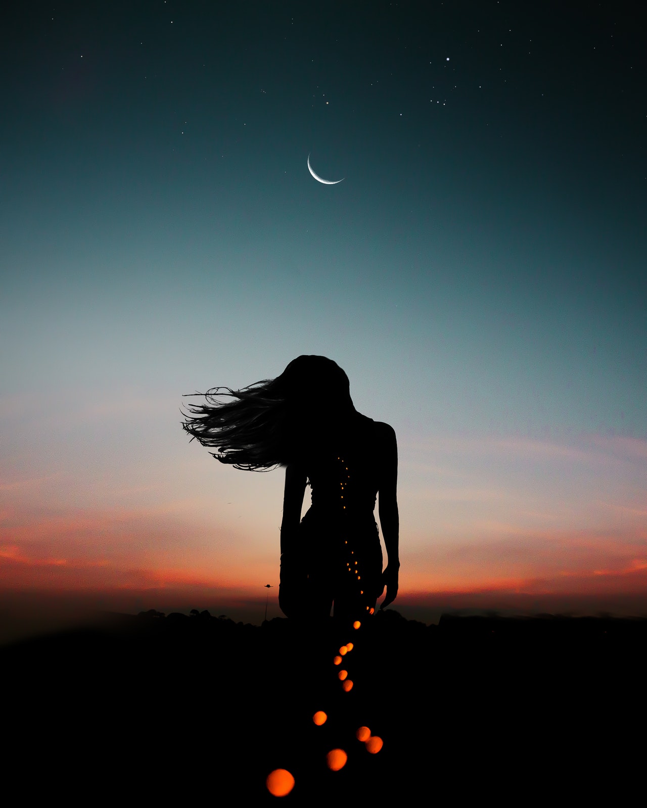 New-Moon-Woman-silhouette-Photo by luizclas from Pexels